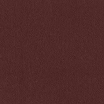 Moroso leather texture sample, reddish-brown, granular grain with tonal variations; labeled “Ritz” material for furniture upholstery.